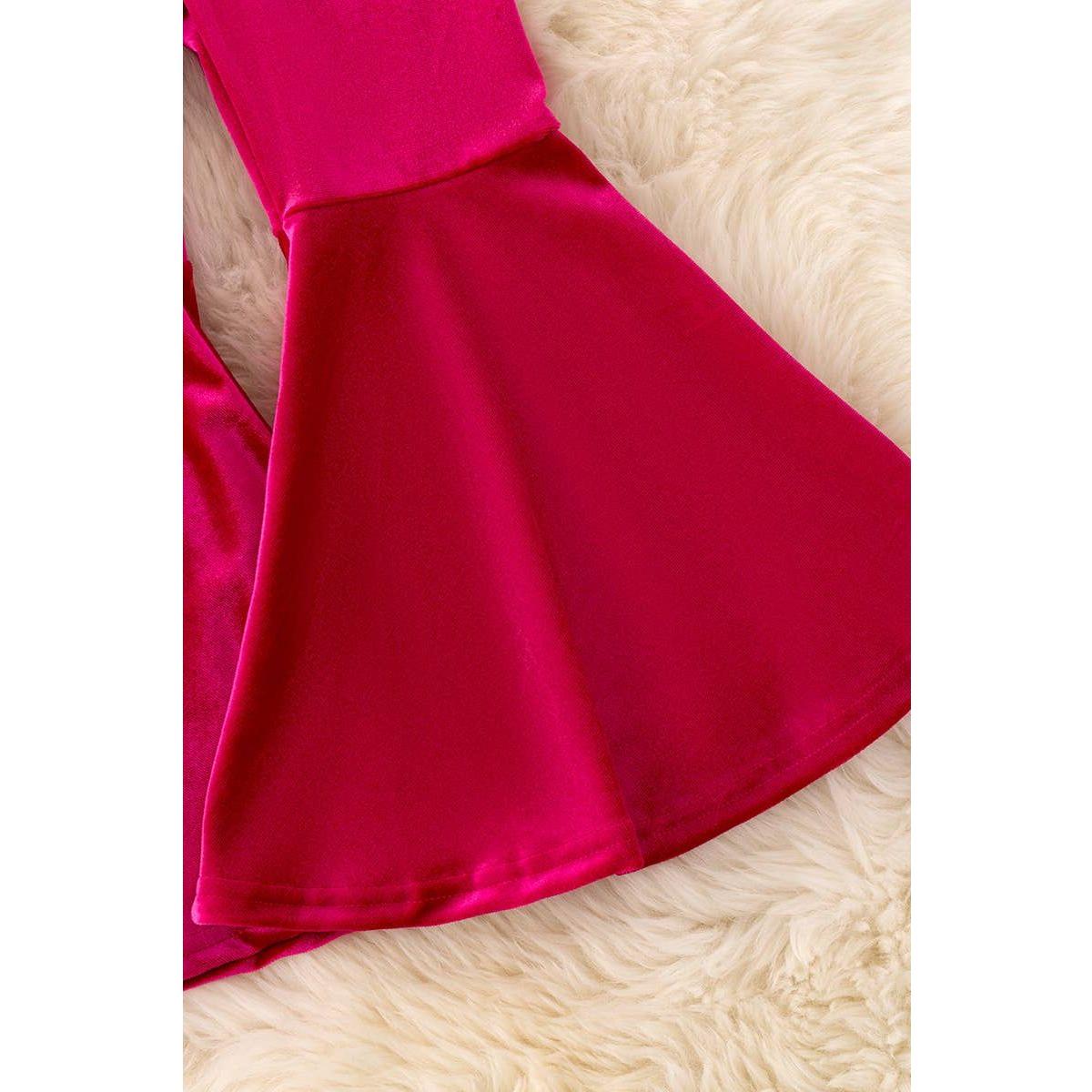 Fuchsia velvety bell bottoms.