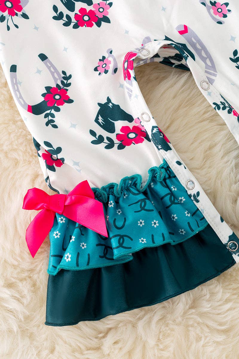 Horseshoe printed on white baby romper with ruffle hem. RPG52076