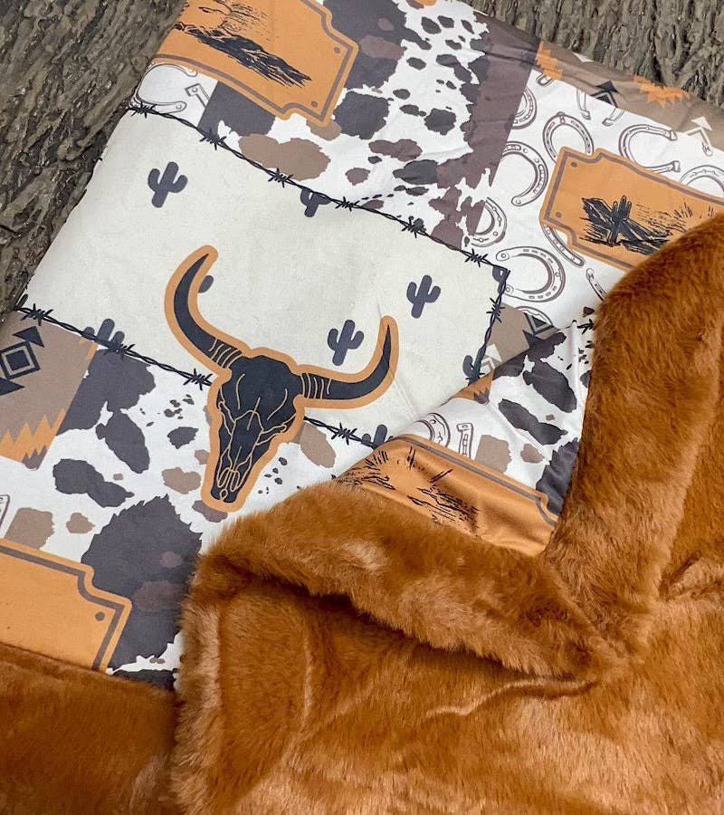 32 inch X 32 inch bull skull and cow printed baby blanket. BL0508