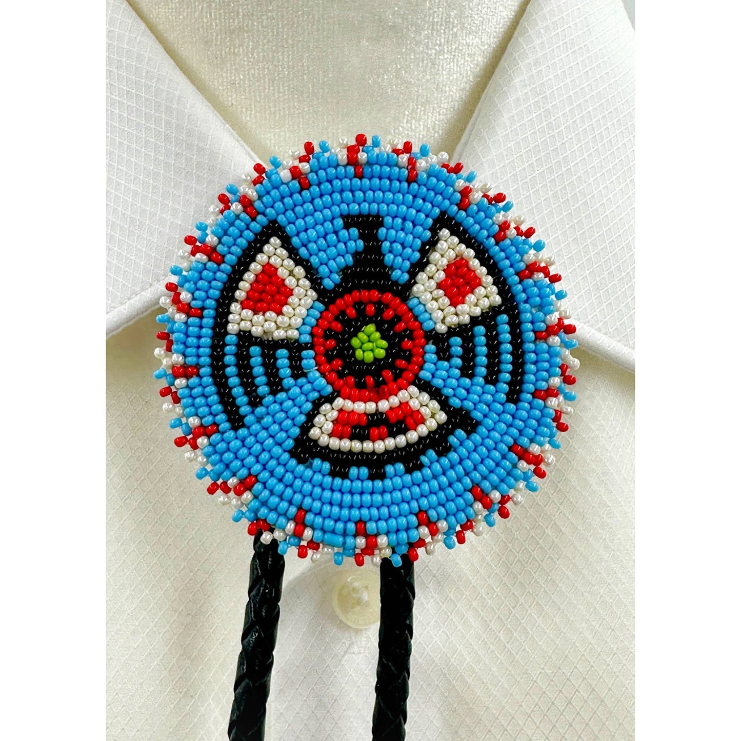 Handmade beaded Cyan Blue Thunderbird leather Bolo Tie