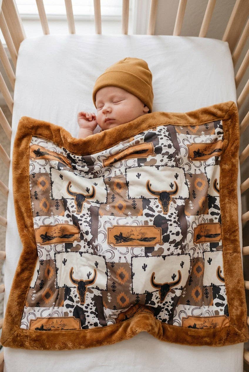 32 inch X 32 inch bull skull and cow printed baby blanket. BL0508