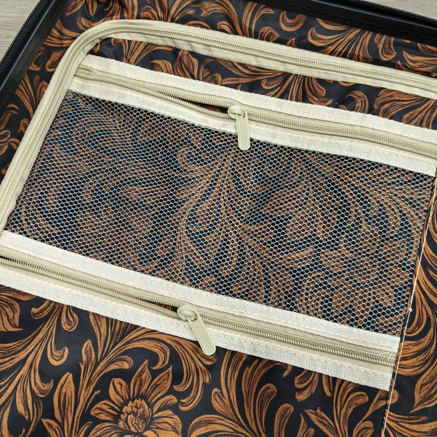 Floral tooling print luggage rolling suitcase 