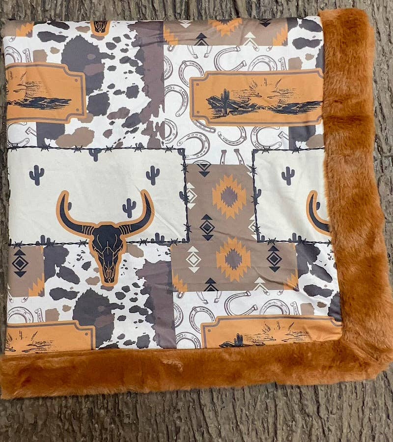32 inch X 32 inch bull skull and cow printed baby blanket. BL0508