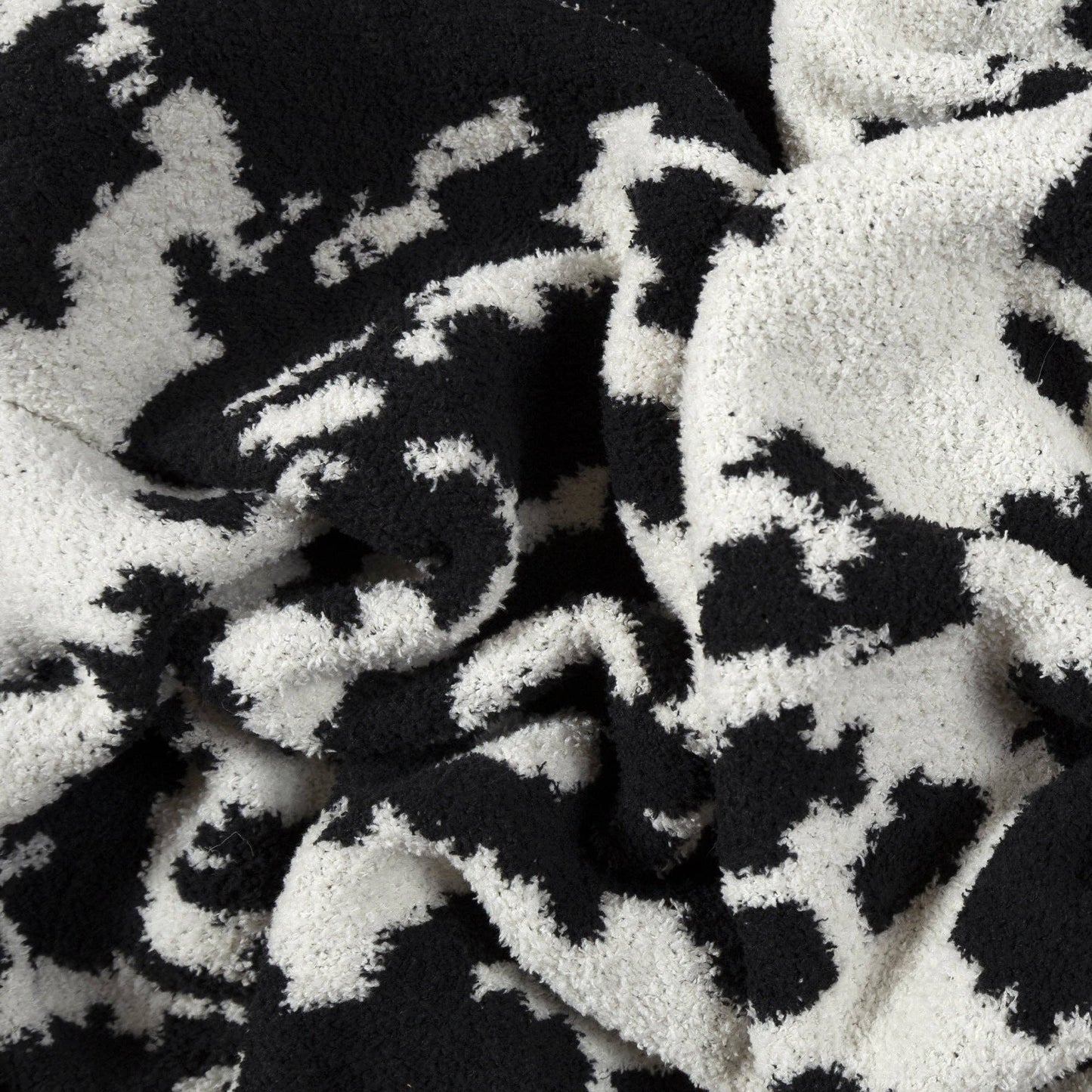 Wrangler Black & White Cowhide Stretchy Throw Blanket