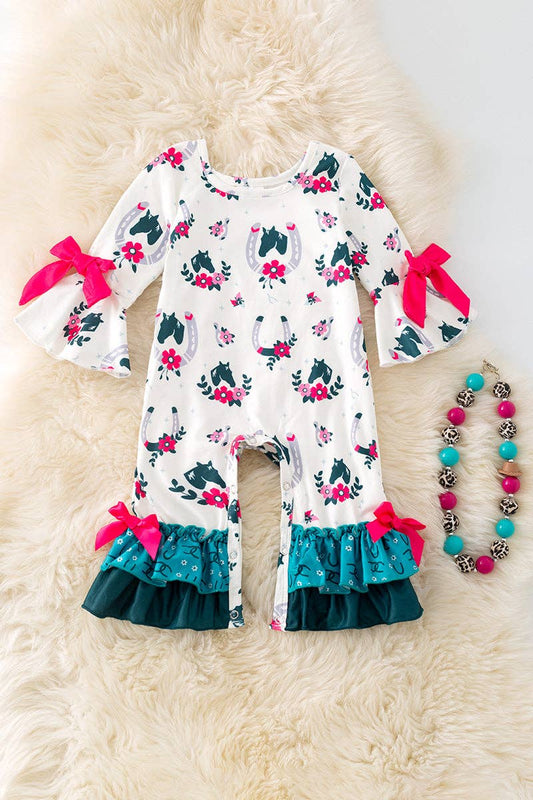 Horseshoe printed on white baby romper with ruffle hem. RPG52076
